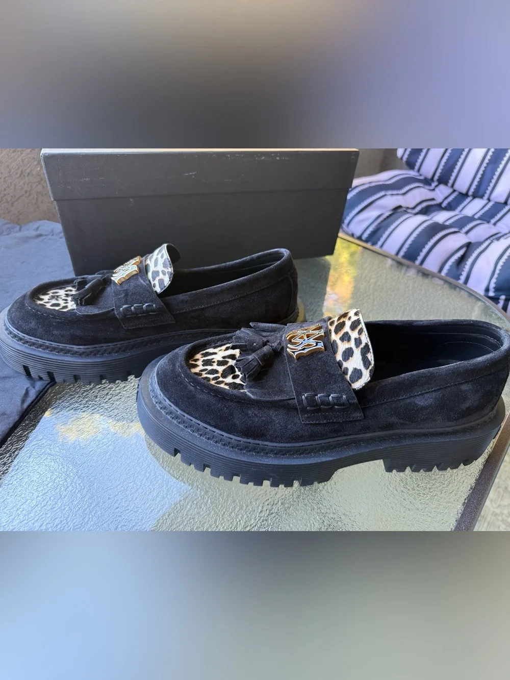 AMIRI Black Suede Tassel Loafers with Leopard Accent and Gold Crest